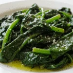 Delicious couve branca refogada served, perfect for a healthy meal.